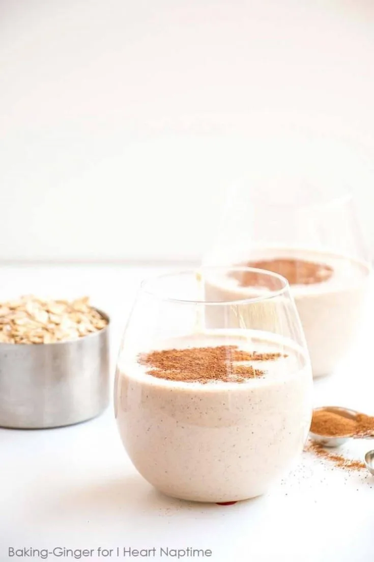 Two small glasses of healthy cinnamon roll breakfast smoothie.