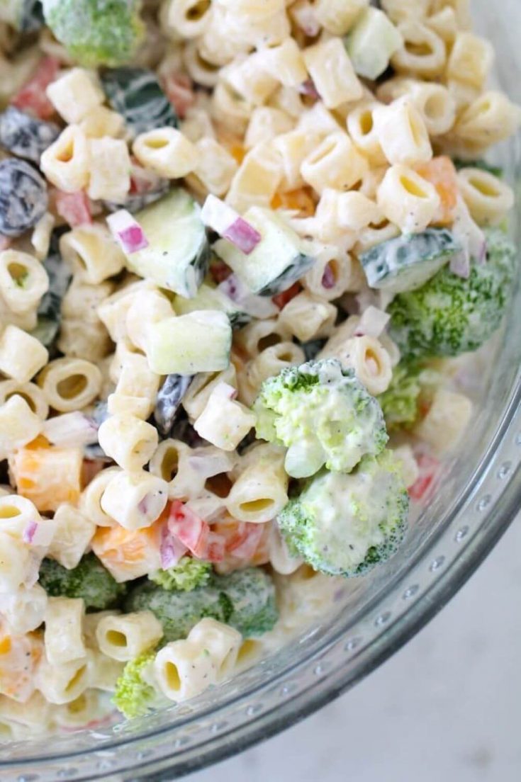 A closeup bowl of the best creamy pasta salad.