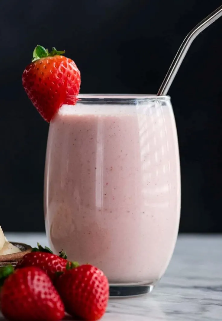 A delicious glass of strawberry banana smoothie.