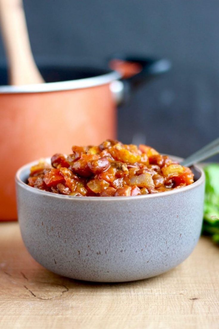 A gray bowl filled with vegan pumpkin chili.