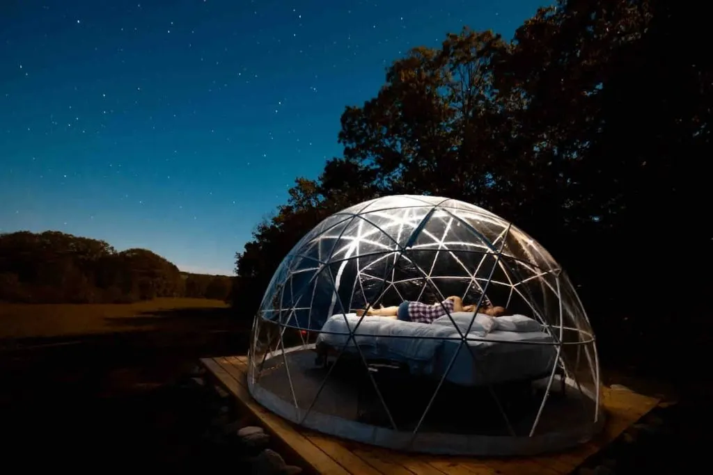 A geometric see-through dome for rent in the Maine woods.