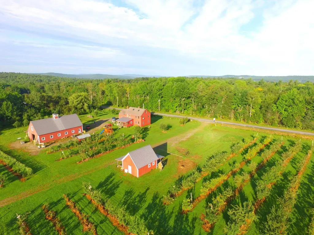 An overhead view of the apple orchard and farm buildings at Hooper's Orchard in Maine.