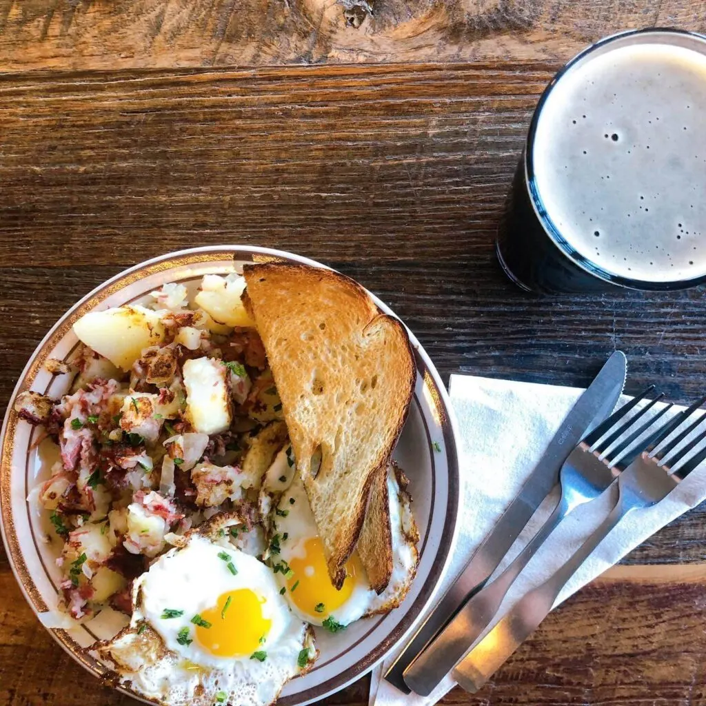 A plate of corned beef hash with eggs and toast from Mason's Brewing near Bangor, Maine.